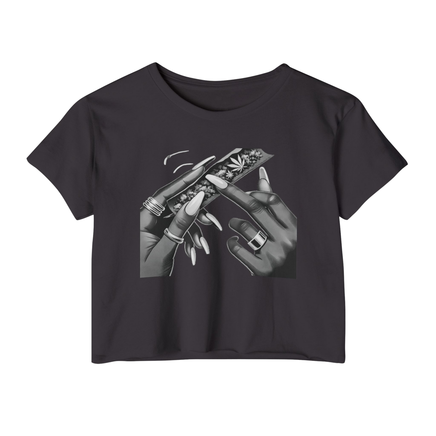 Women's cropped t-shirt with bold graphic of manicured hands rolling a blunt, raw hem edges, and relaxed fit.
