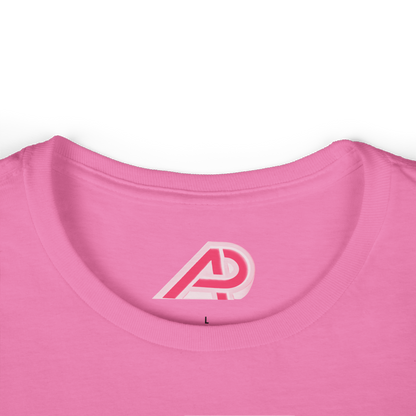 Close-up of a pink shirt with a logo on the collar against a white background